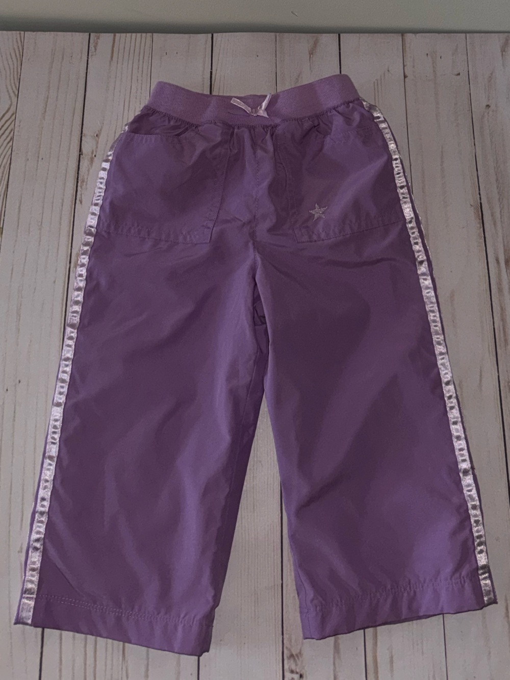 Purple windbreaker pants